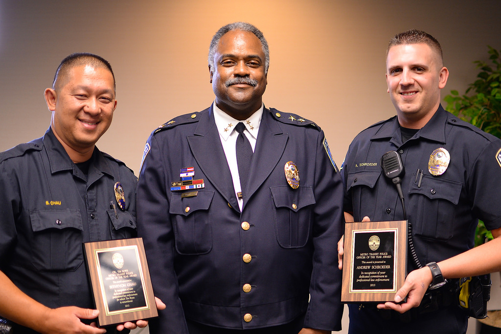 Officer Sithyvon Chau, Police Chief John Harrington and Officer Andrew Schroeder at the Metro Transit Police Department's 2014 Awards Ceremony.