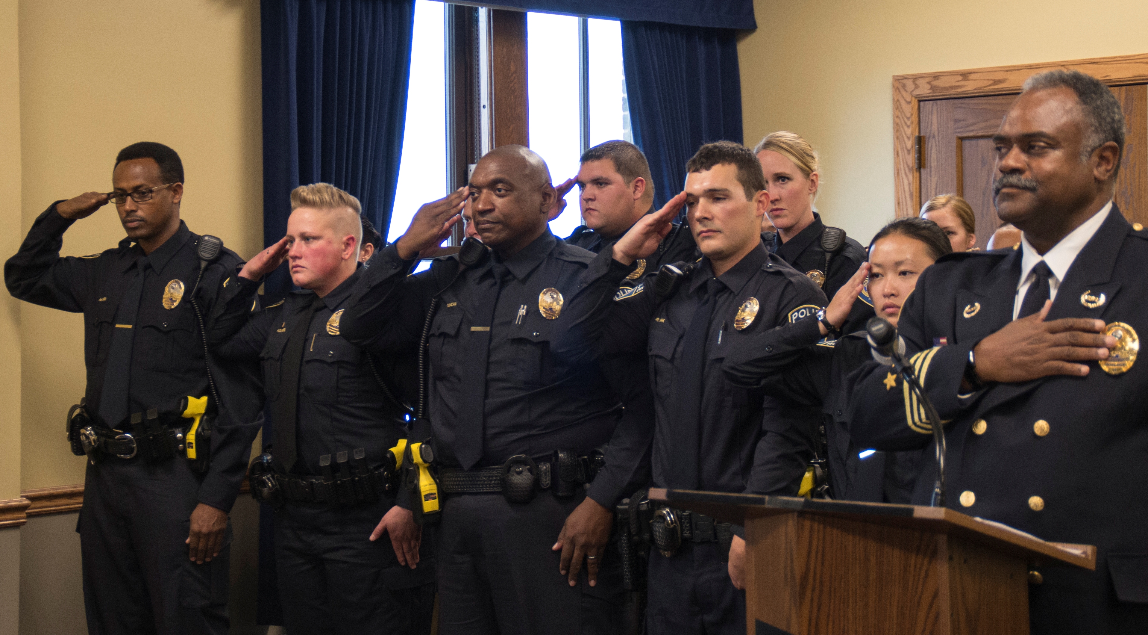 Metro Transit Police Chief John Harrington and officers at a swearing-in ceremony at the Union Depot on Thursday, Nov. 5, 2015.