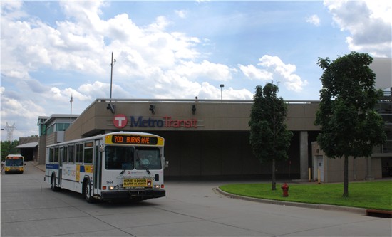 A bus rolls past Metro Transit's East Metro Transit Facility