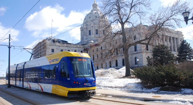 Image of METRO Green Line train in front of Minnesota State Capitol. 