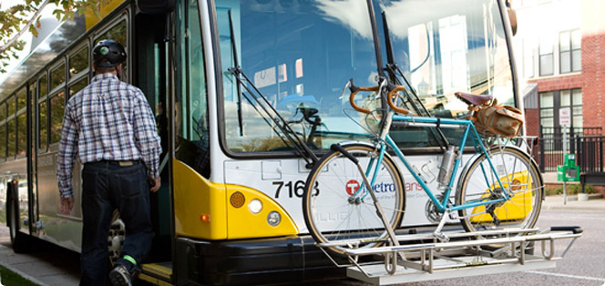Bicyclist Boarding Bus