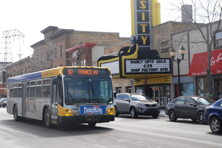 A Route 6 bus travels on 4th Street SE in Dinkytown.