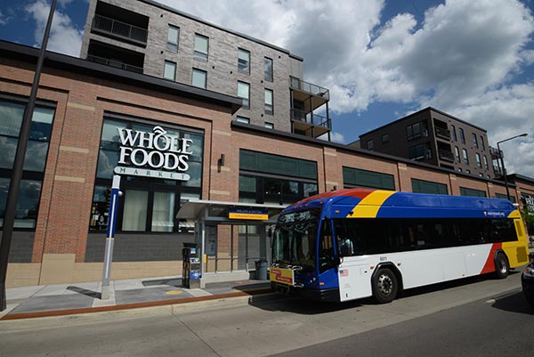 A Line bus at station near Whole Foods