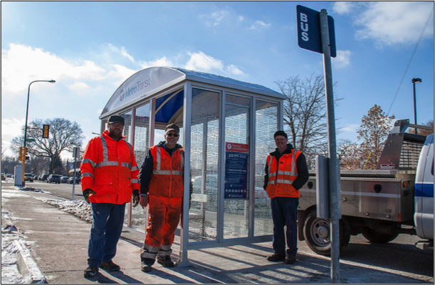 Click image to see full version on Flickr. Maintenance crew at work installing a customer shelter.