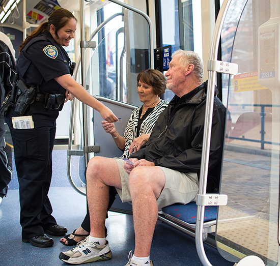 Metro Transit Police officer checking light rail fares