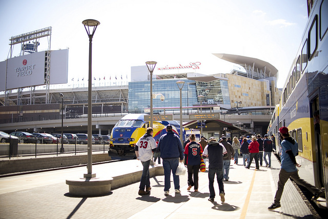 Twins fans head toward Target Field after arriving on the Northstar Commuter Rail Line.