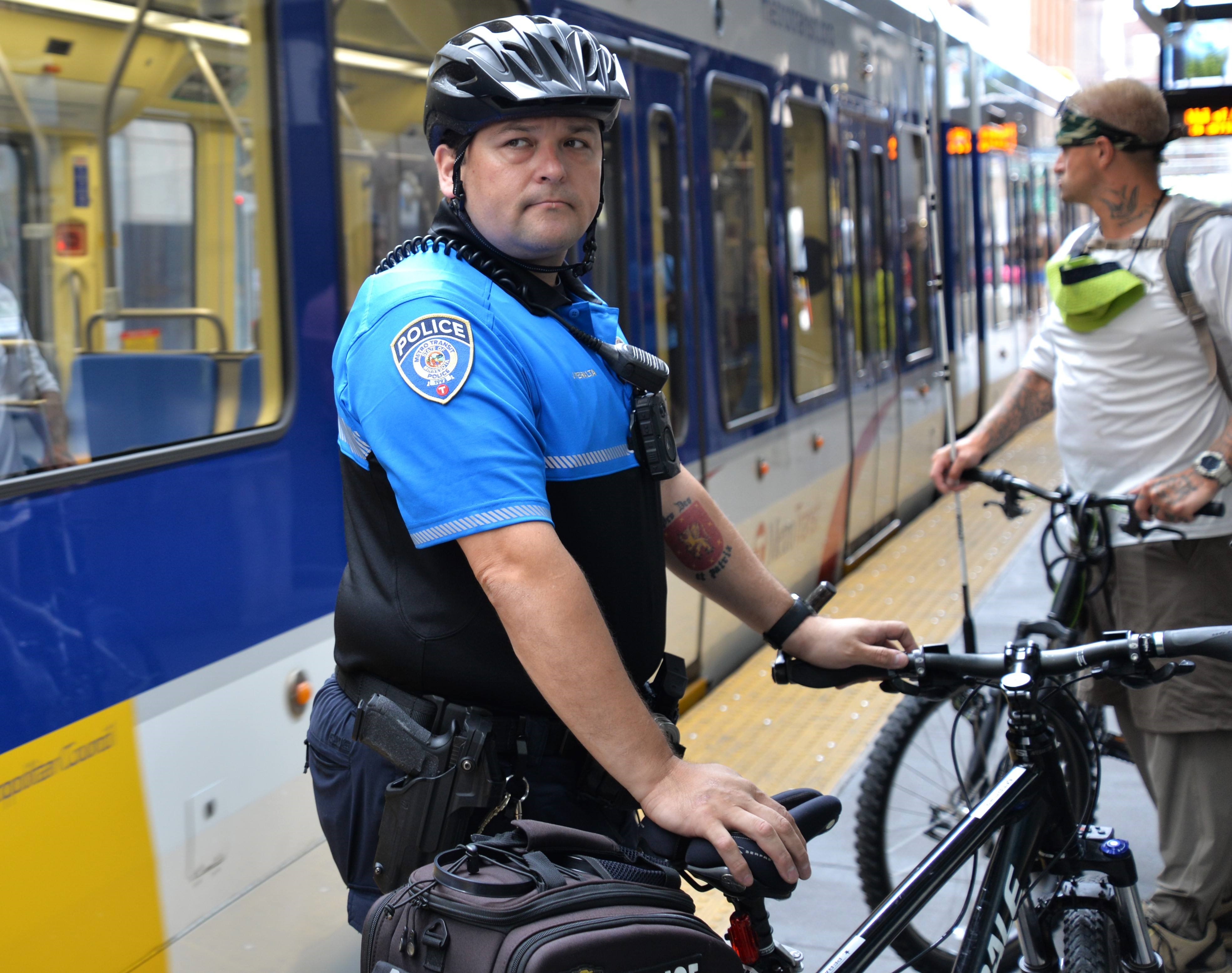 Officer Juan Peralta on patrol in downtown Minneapolis. Officer Juan Peralta on patrol in downtown Minneapolis.