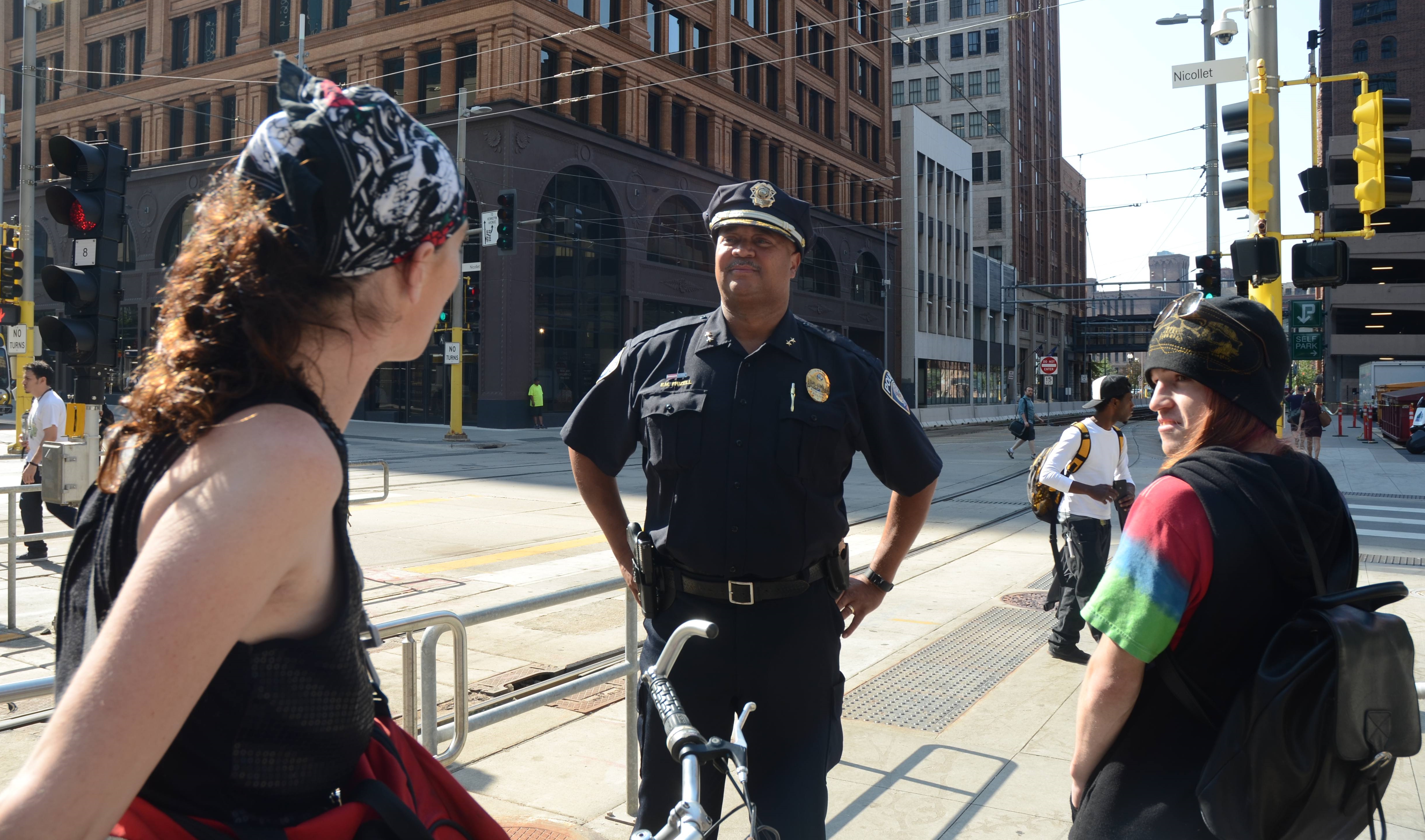 Metro Transit Police Chief Eddie Frizell visits with customers at the Nicollet Mall Station in downtown Minneapolis. 