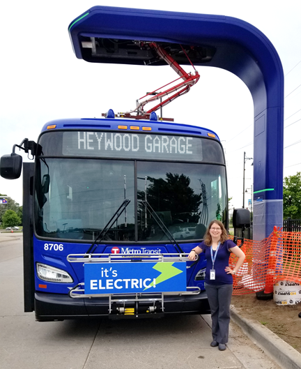 Engineer Carrie Desmond with an electric bus.