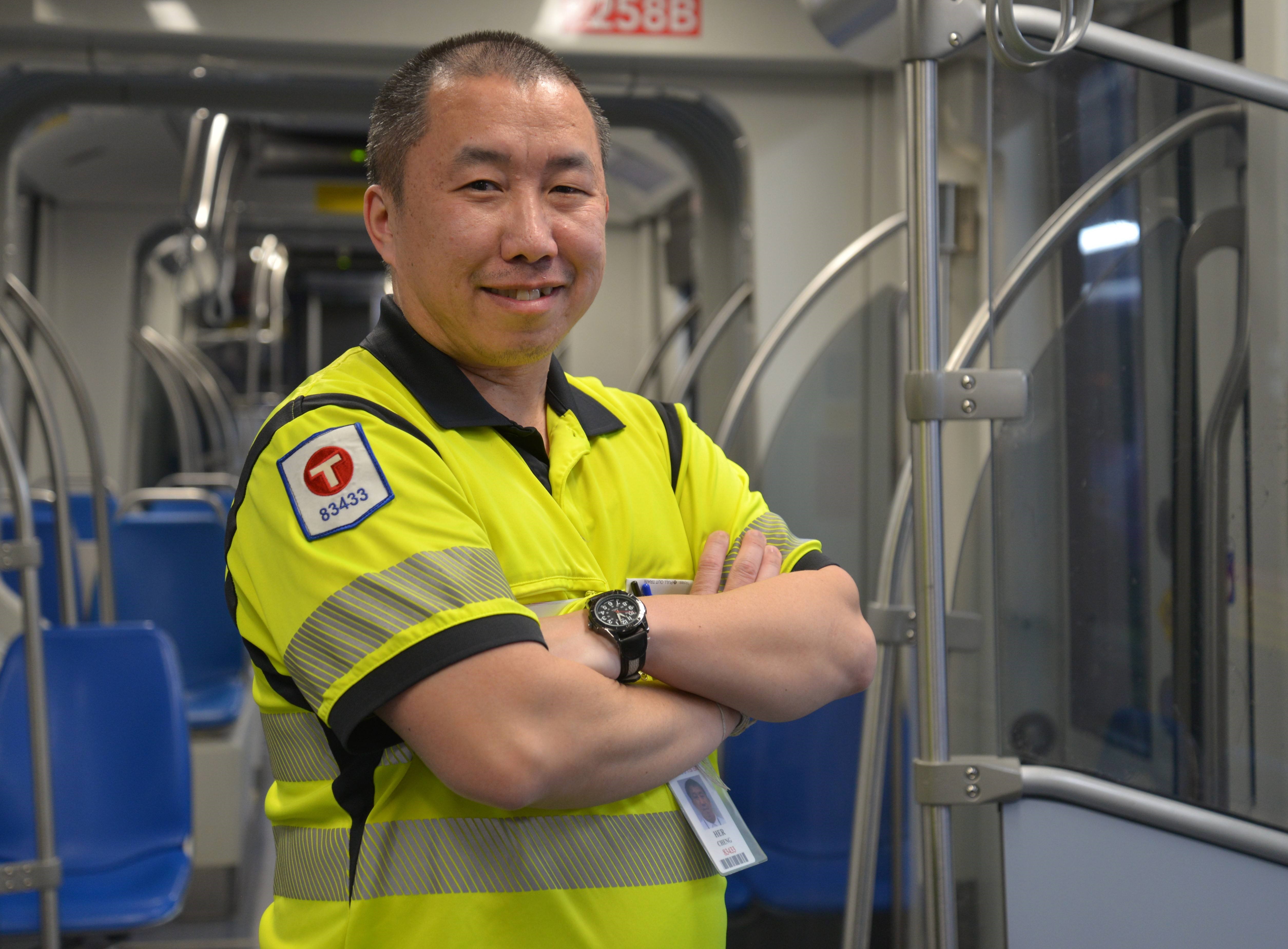 Train Operator Her Cheng onboard a light rail vehicle.