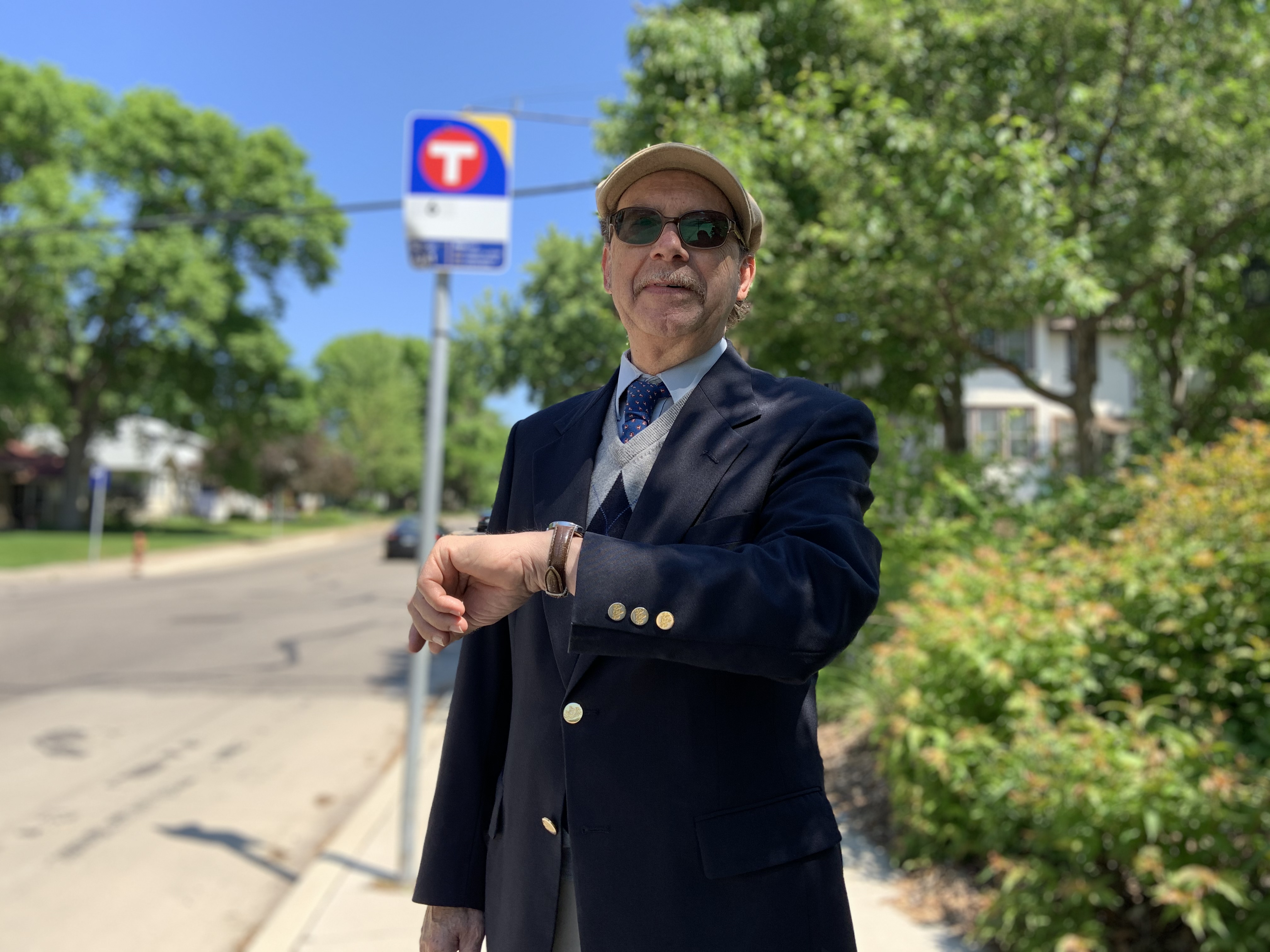 Senior Planner John Dillery at a bus stop. Senior Planner John Dillery at a bus stop.