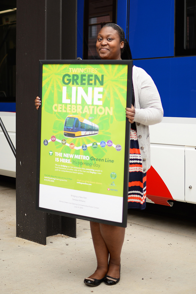 Green Line poster contest winnter Genesia Williams with her winning entry on Thursday, June 12, 2014.