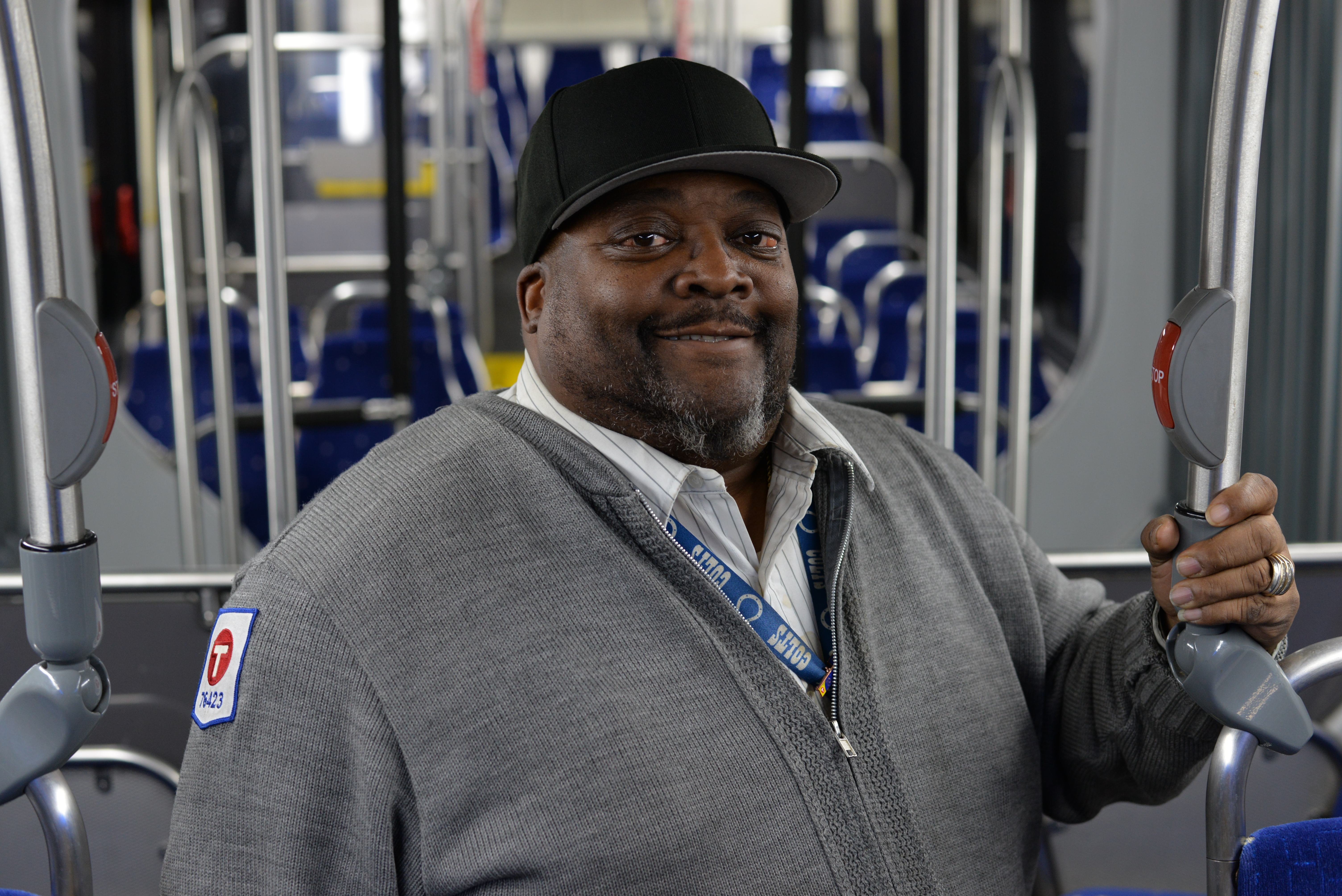 Operator Troy Macon on a bus. 