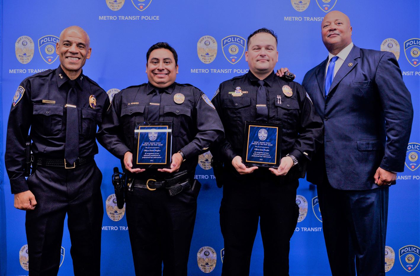 MTPD Chief Ernest Morales III, Officers of the Year Daniel Hughes (2021), Juan Peralta (2022), and former MTPD Chief Eddie Frizell