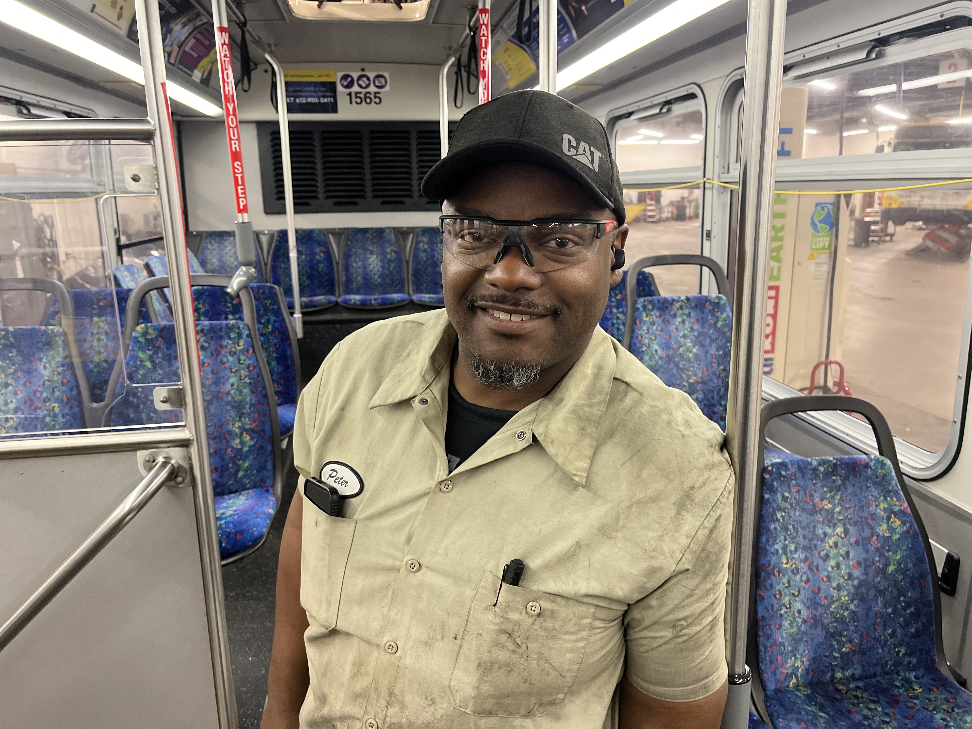 Helper Peter Lockhart inside a Metro Transit bus. Helper Peter Lockhart inside a Metro Transit bus.