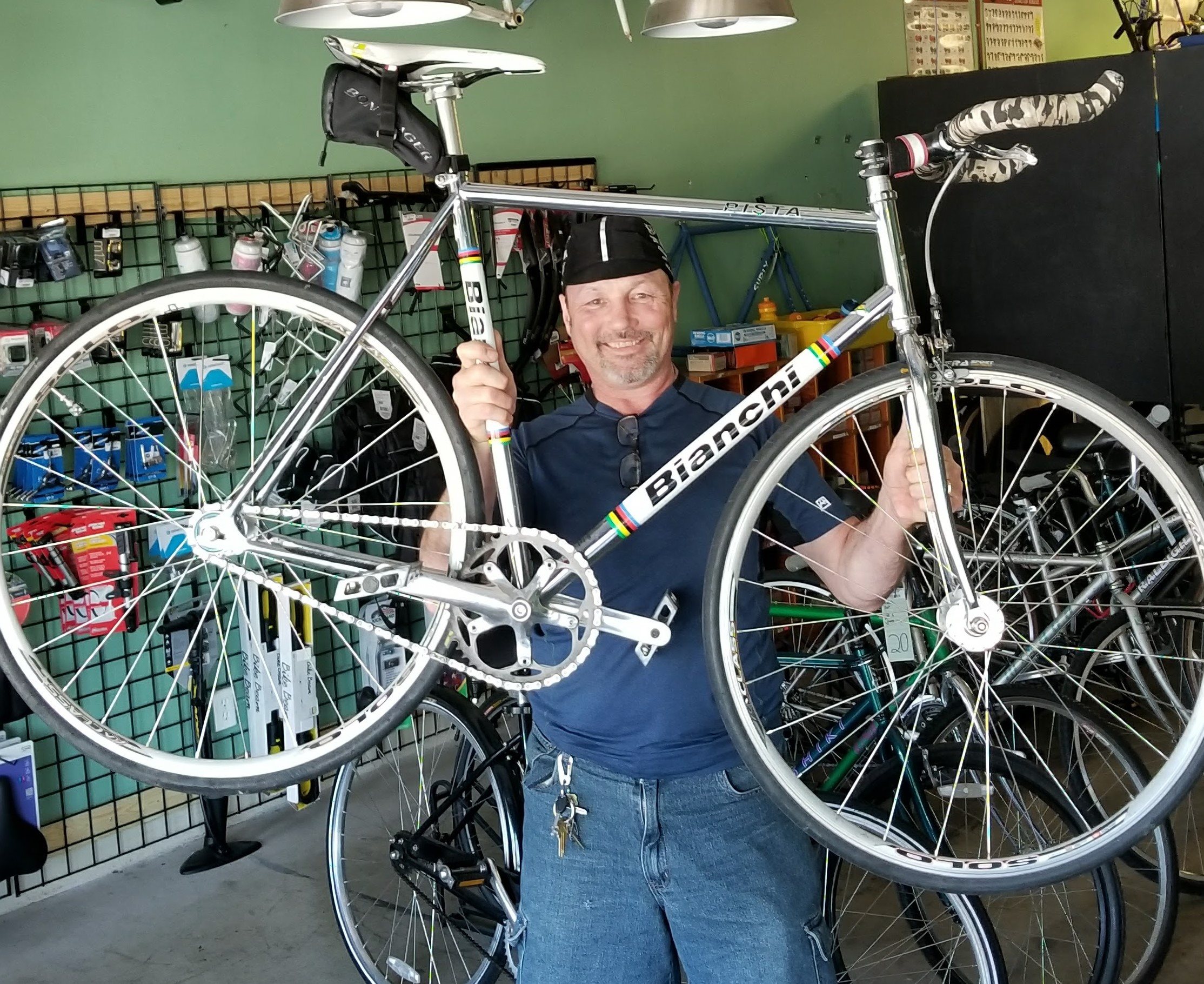 A man holds a bike that was stolen and returned with help from Metro Transit police and staff.