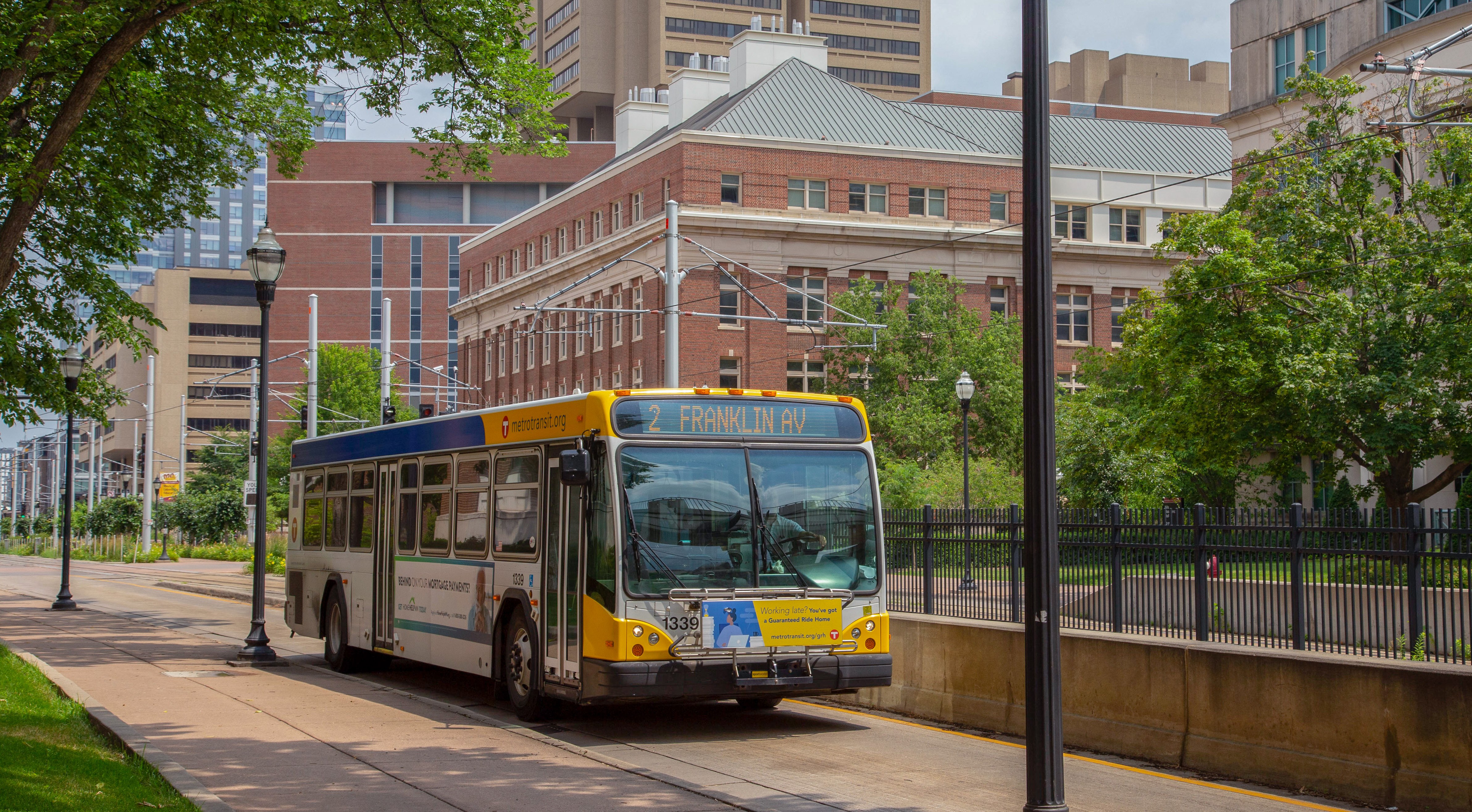 A Route 2 Metro Transit bus travels on the University of Minnesota campus in Minneapolis.