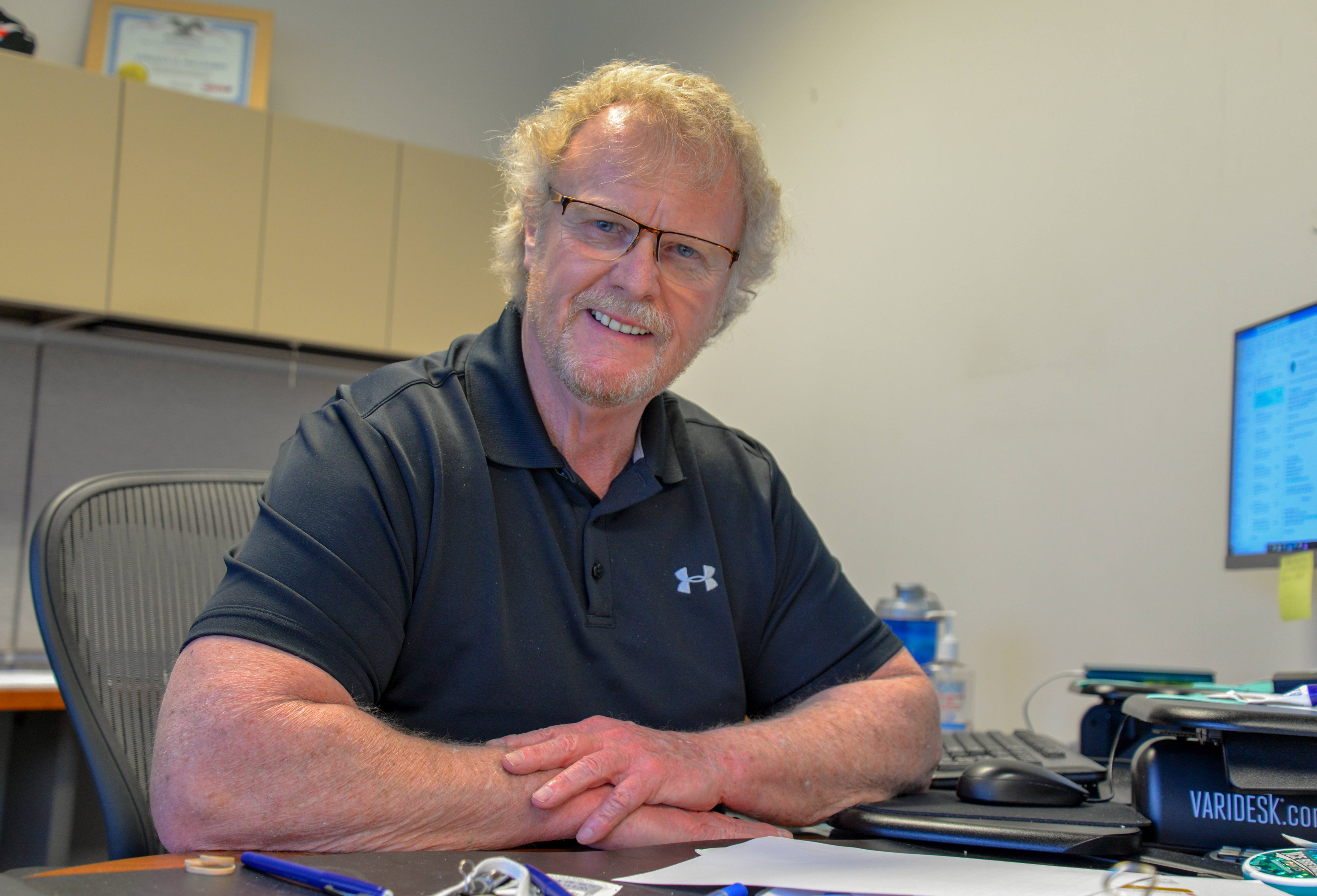 Chief Operating Officer Vince Pellegrin at his desk. 