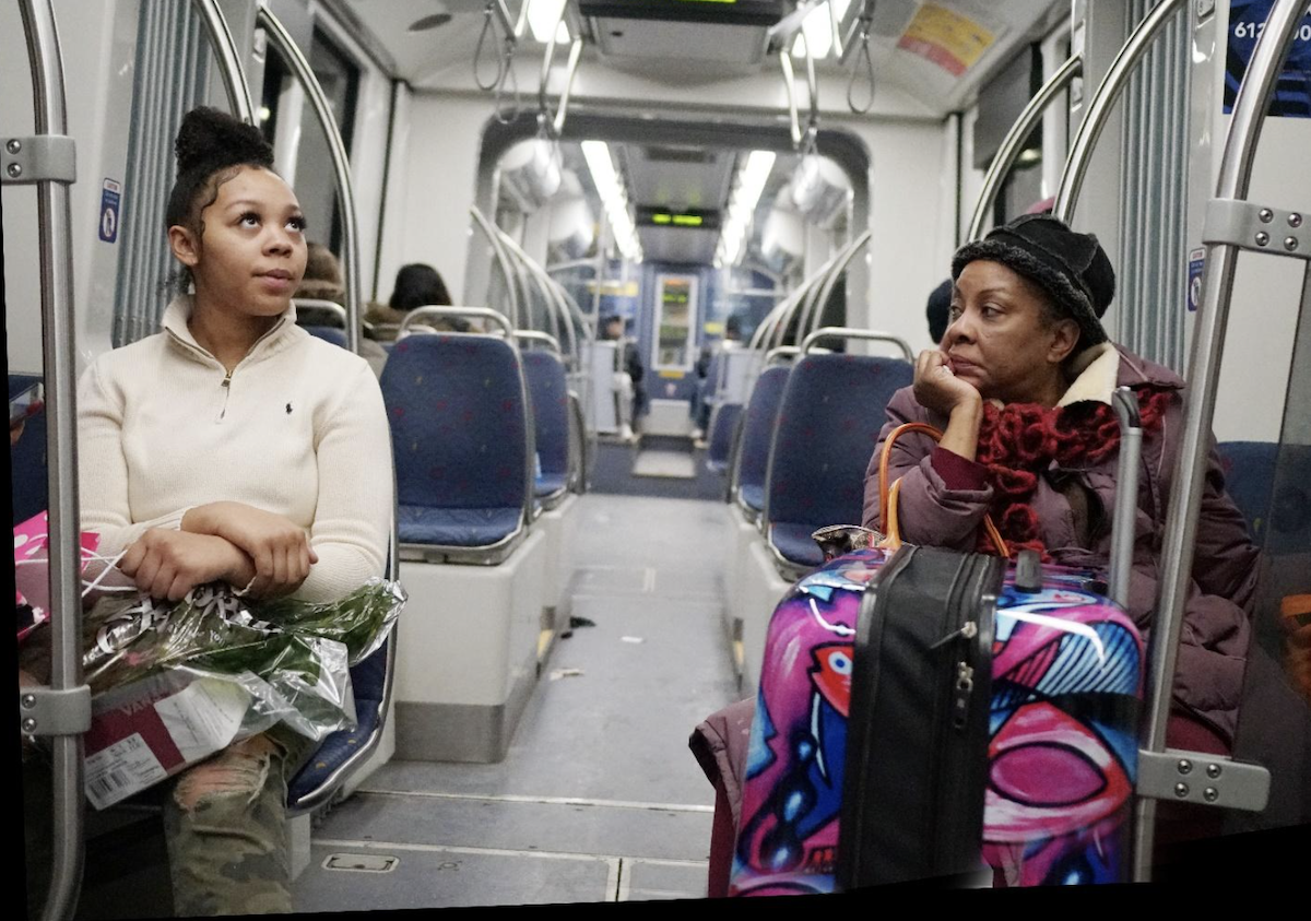 Valin Photo of people sitting on bus