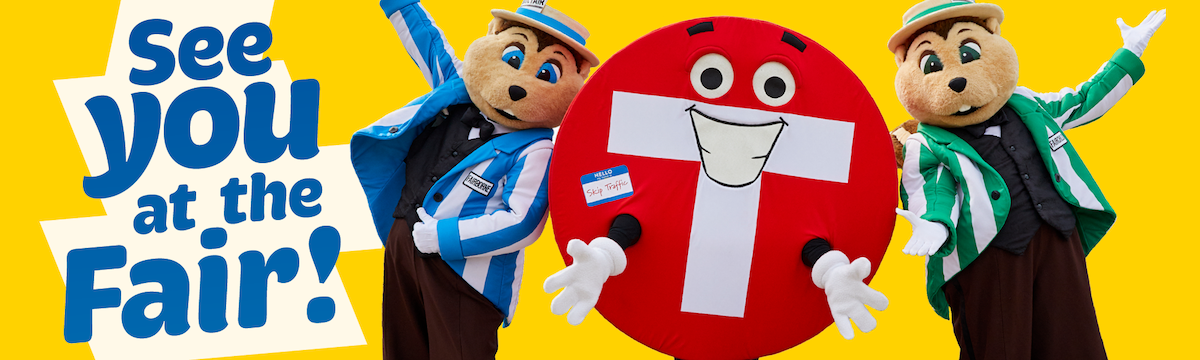State fair characters interacting with Metro Transit mascot.