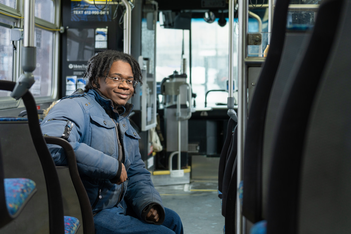 TAP customer riding transit.