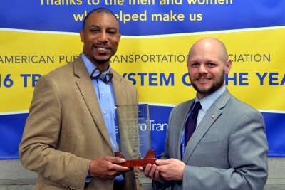Equal Opportunity Consultant Gary Courtney, left, and Deputy Chief of Operations-Bus, Brian Funk, accepted the Model Program award this week at the National Transit Institute’s Transit Trainers Workshop.